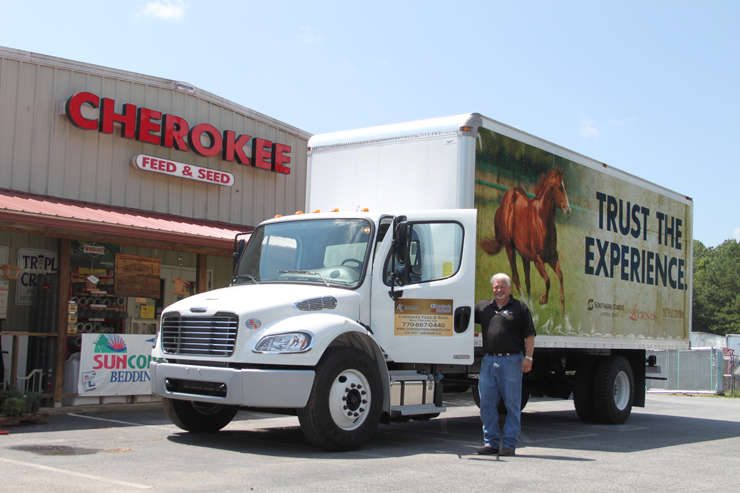 Cherokee Feed & Seed truck in front of store