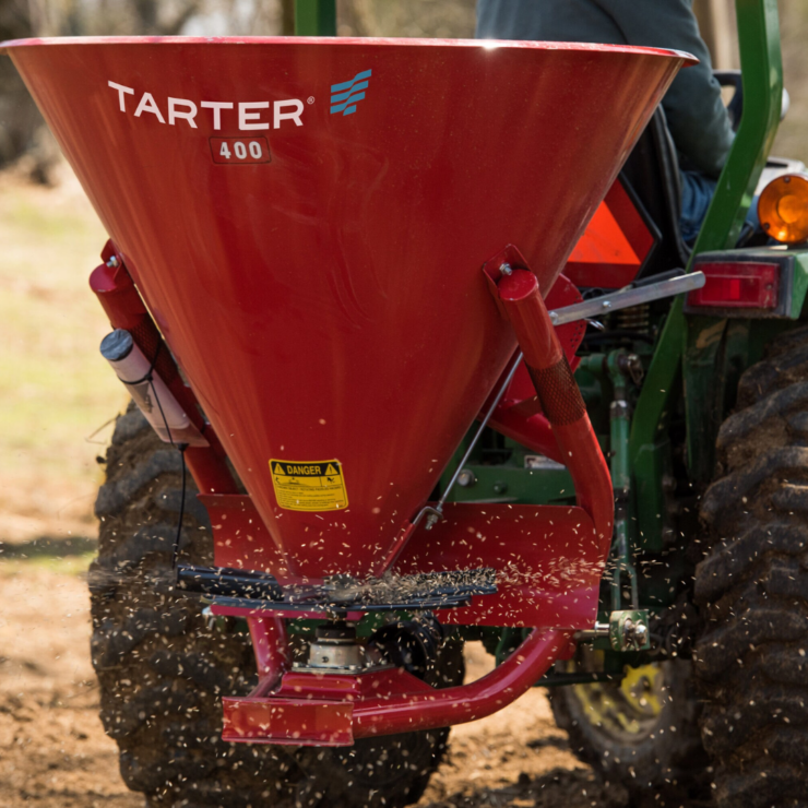 Tarter Fertilizer Spreader connected to tractor