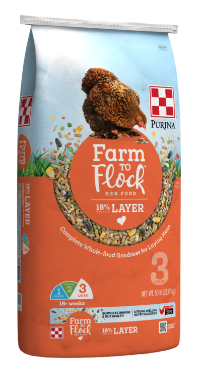 orange bag of Purina Farm to Flock 18% Layer Food with hen illustration 