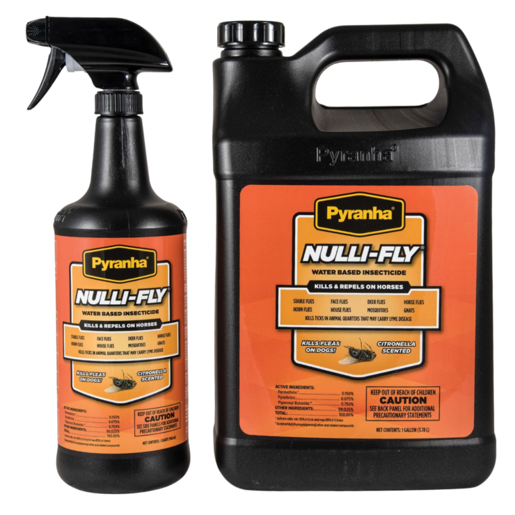 Pyranha Nulli-Fly fly repellent spray in black containers with orange labels.