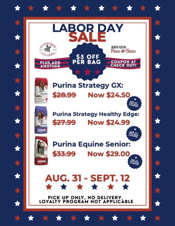 Labor Day Sale: Save On Horse Feed!: Purina horse feed bags from sale pictured in red, white and blue colors, original prices slashed out showing new ones plus the additional $5 off sticker